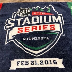 Lightly used NHL Minnesota Stadium Series 2016 Blanket - Navy and Green